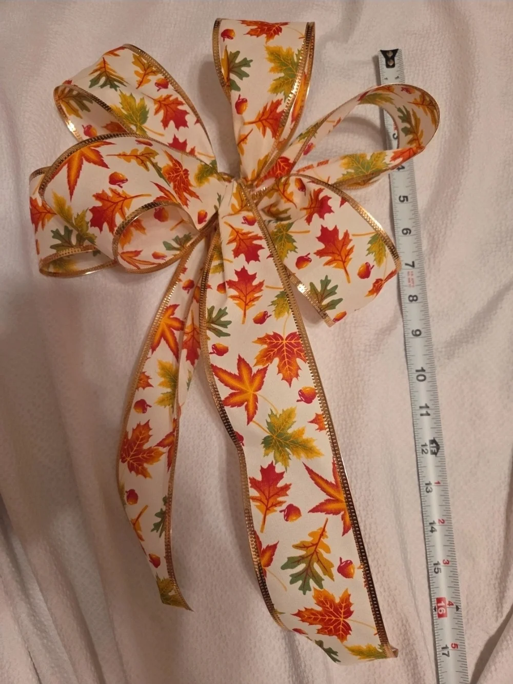 Festive Autumn Leaf Holiday Bow Ribbon - White with Orange, Red & Green Leaves